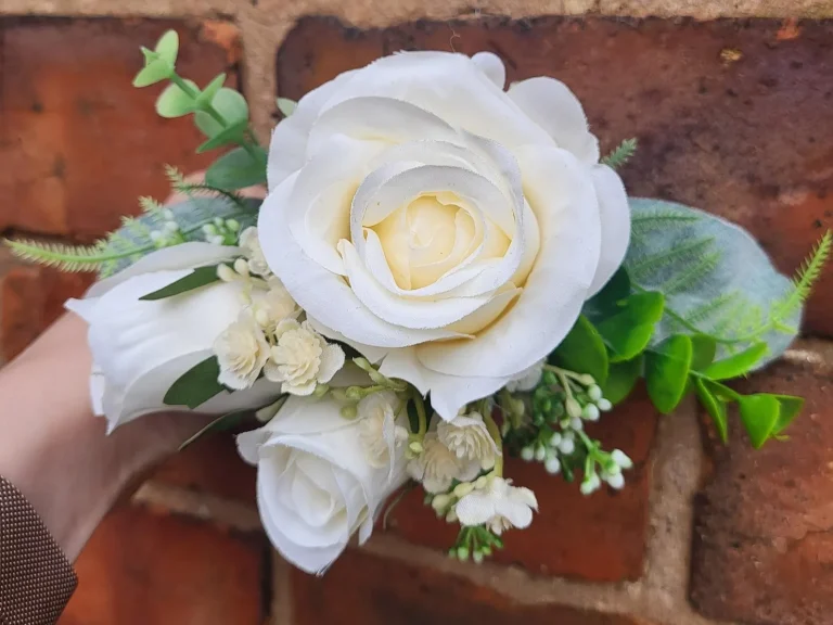 front view of an ivory dog corsage